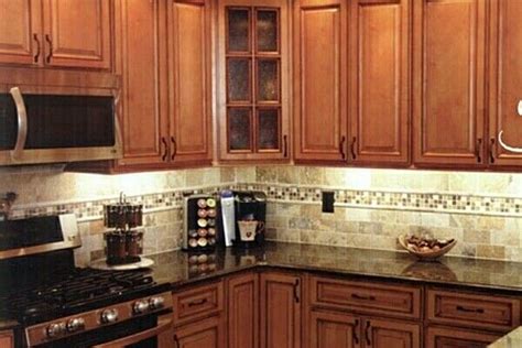 The mix of the gold, silver, and copper specks are getting together to make a beautiful piece of kitchen. tile backsplash dark countertop | Trendy kitchen ...