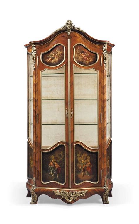 A French Ormolu Mounted Rosewood And Vernis Martin Vitrine Of Louis