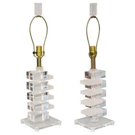 Beautifully designed, this glass table lamp flaunts a gorgeous blue and green hue that adds a soft touch five clear crystal orbs make up the luxe body, all stacked in a row ornament between them, decreasing in size as it makes its way closer towards. Pair of Stacked Block Form Lucite Lamps | From a unique ...