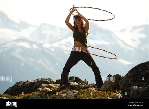 Hula Hoop Artist Working Out At The Top Of Whistler Mountain Whistler