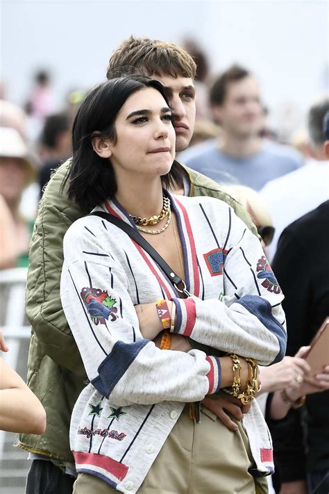 Here, we outline their romance. dua lipa and anwar hadid get cozy at the british summer ...