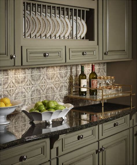 If you have bold and bright accent colors in. Kitchen:Kitchen Sage Green Painted Cabinets Black Granite ...