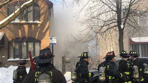 Video Chicago Firefighter Jumps From Roof Of Burning Building