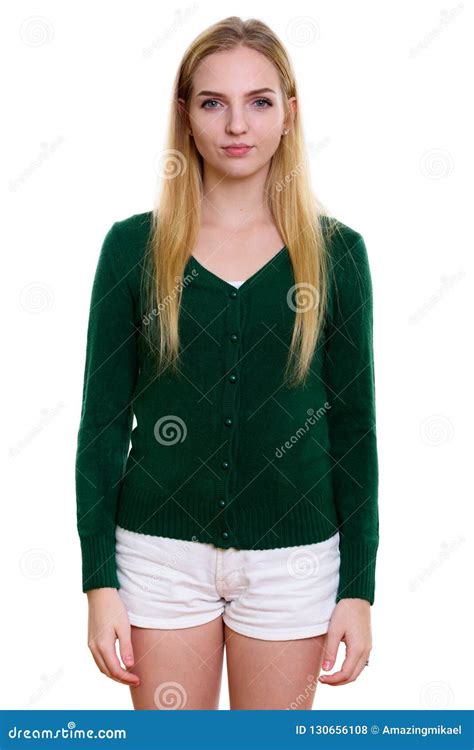 Studio Shot Of Young Beautiful Teenage Girl Standing Stock Photo