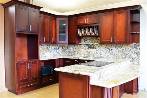 Predominantly red undertones are common on there are many kitchen interior designs featuring the use of cherry wood kitchen cabinetry to inspire you. Cherry Shaker - Deco Kitchen and Bath