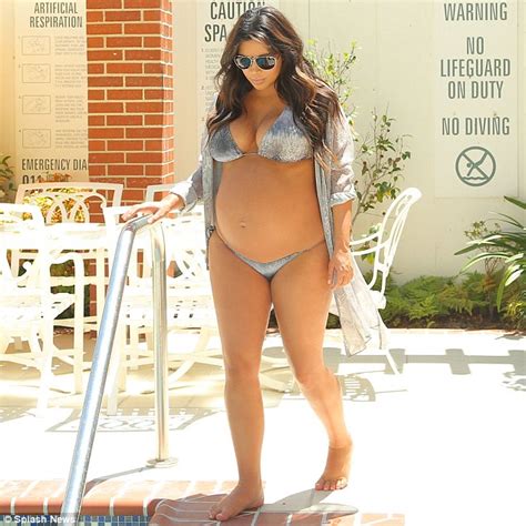 Kim Kardashian Shows Off Baby Bump In Bikini Bollygroup