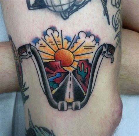 Small Traditional Biker Tattoos Handlebars With Sunset And Open Road On