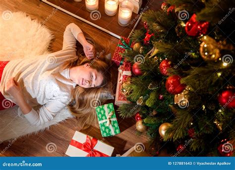 Woman Lying On The Floor In Christmas Decorated Home Stock Image Image Of Event Holiday