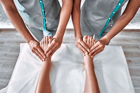 Professional Masseuses Doing Massage For Legs Stock Image Image Of Hands Background