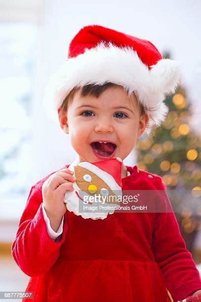 Santa Eating A Cookie Photos And Premium High Res Pictures Getty Images