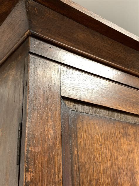 Ds George Iii Oak And Mahogany Cupboard On Secretaire Projecting Cornice Over Two Panelled