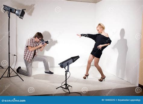 Model Poses For Photographer In Photo Studio Stock Image Image 13402225