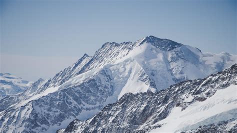 Download Wallpaper 1366x768 White Glacier Mountains Summit Tablet