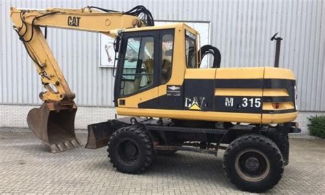 Cat's small excavators boast increased versatility, power and flexibility when compared to the mini excavator range. Caterpillar Cat M315 Excavator (Prefix 7ML) Service Repair ...