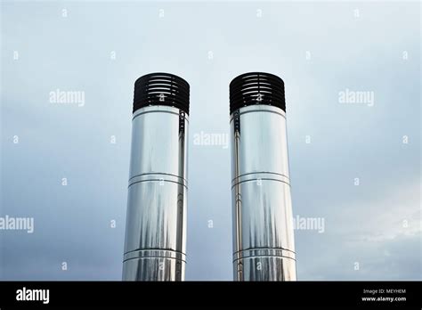 Two Industrial Chimneys Stock Photo Alamy