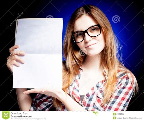 Happy Young Girl With Nerd Glasses Holding Exercise Book Stock Image
