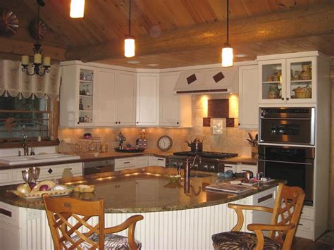 Distressed white kitchen cabinets in log homes. We love the design of this Ward log home Kitchen with its ...