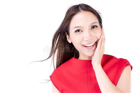 Portrait Beautiful Woman In A Red Dress Showing A Happy Expression On A White Background Stock