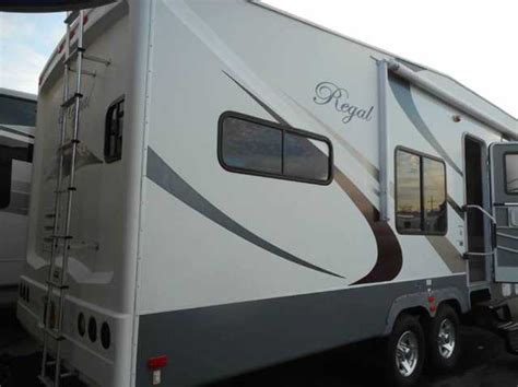 When you're looking to go camping in style but don't want to break your bank, a used fifth wheeler is just the thing for you! 2008 Used Fleetwood Prowler Regal 315RKSA Fifth Wheel in ...