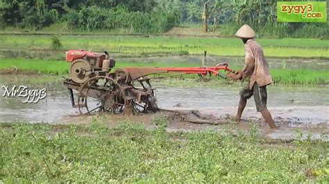 Two Wheel Tractor Kubota Mud Plow For Rice Field Youtube