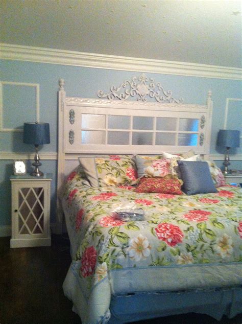 This diy mirror frame is an easy and budget friendly bathroom update. I made this wonderful headboard from an old french door I ...