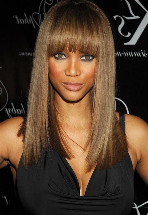 tyra banks long hairstyle straight hairstyle with blunt bangs for black women