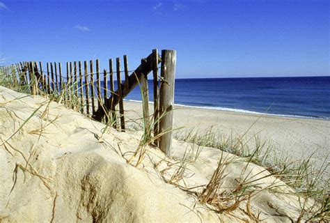 Beach Fence Dunes Sand Ocean Shore Coast Photograph By Jose Azel