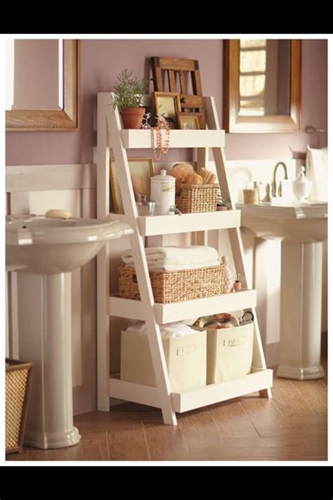 It's a super cute place to decorate! Cute DIY shelf! | Diy bathroom storage, Clever bathroom ...