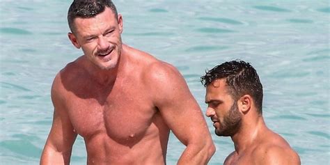 Luke Evans Shows Off His Buff Bod At The Beach With A Friend In Miami Luke Evans Shirtless