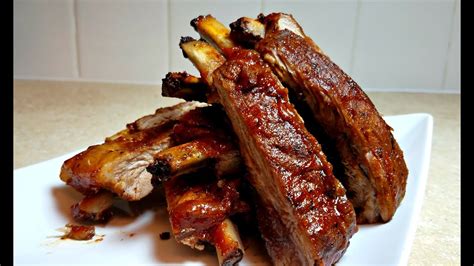 How To Make Bbq Ribs In The Oven Oven Baked Ribs Recipe The Busy