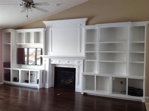 This entertainment center plan will help you build a simple, but solid entertainment stand for your big flat screen tv and a desk for your computer. Built In Entertainment Center Plans With Fireplace, Build ...