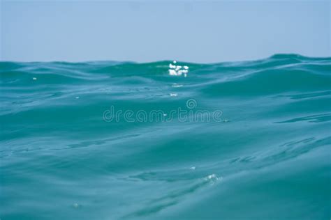 Blue Marin Clear Ocean Water With Waves And Sky With Clouds Shot From