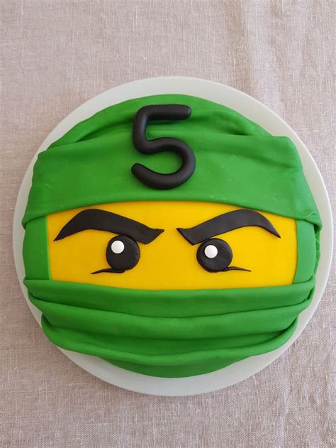 There Is A Cake Made To Look Like A Teenage Mutant Ninja S Head With