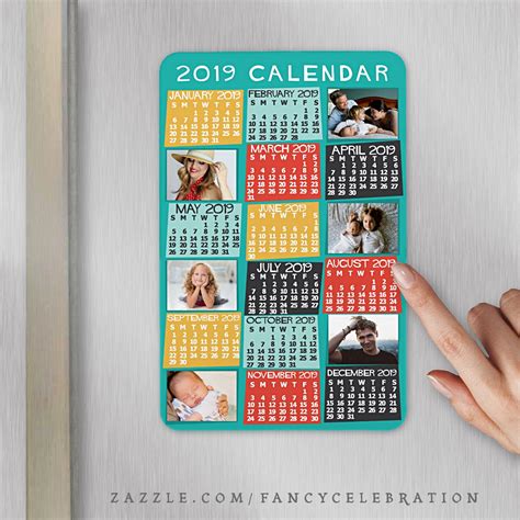 A Calendar With Photos On It Is Being Held Up By A Womans Hand