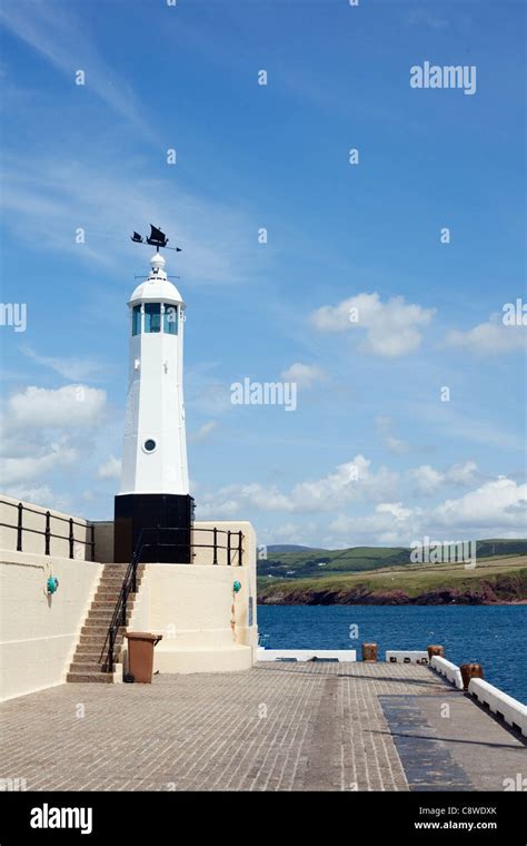 Lighthouse At The End Of Jetty Peel Harbour Isle Of Man Stock Photo