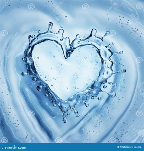 Heart From Water Splash With Bubbles On Blue Water Background Stock