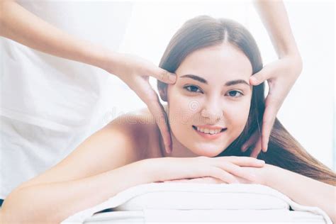 Woman Gets Facial And Head Massage In Luxury Spa Stock Image Image Of Portrait Face 199934937
