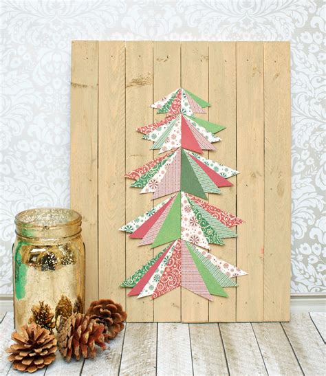 Christmas tree on the wall decor. Simple Wall Paper Christmas Tree Art On A Wood Pallet