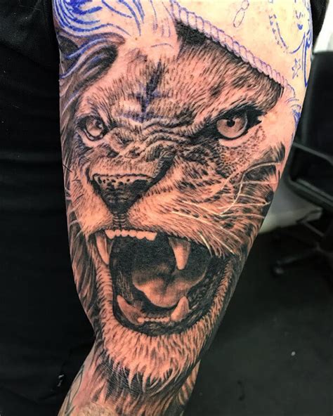 Roaring Lion Arm Tattoo
