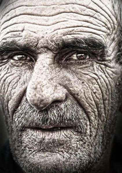 Closeup Portrait Of Old Man Wrinkled Elderly Skin Face Stock Image