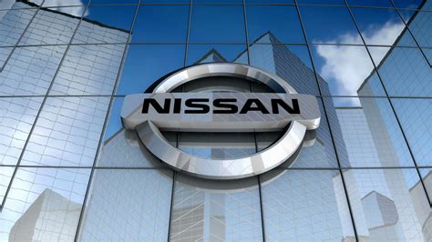 Editorial, Nissan Motor Company Ltd logo on glass building ...