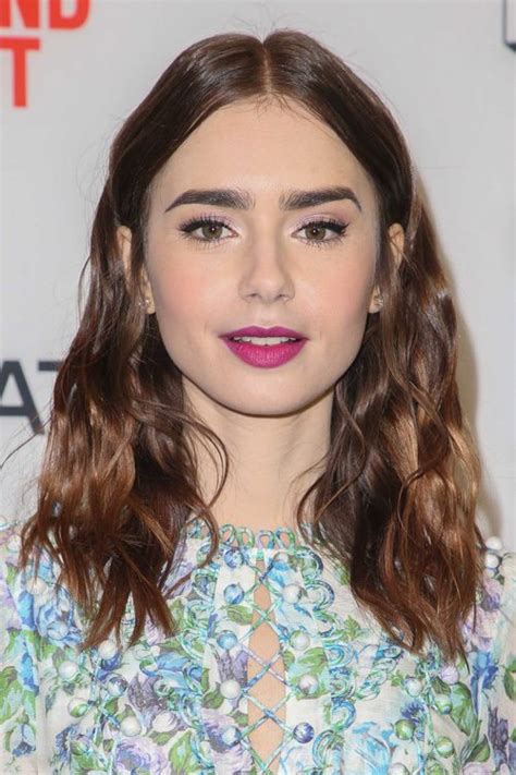 Lily Collins Wavy Medium Brown Peek A Boo Highlights Hairstyle Steal