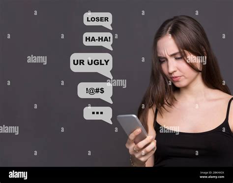 Cyberbullying Sad Caucasian Girl Reading Harassing Text Messages On Smartphone Grey Background