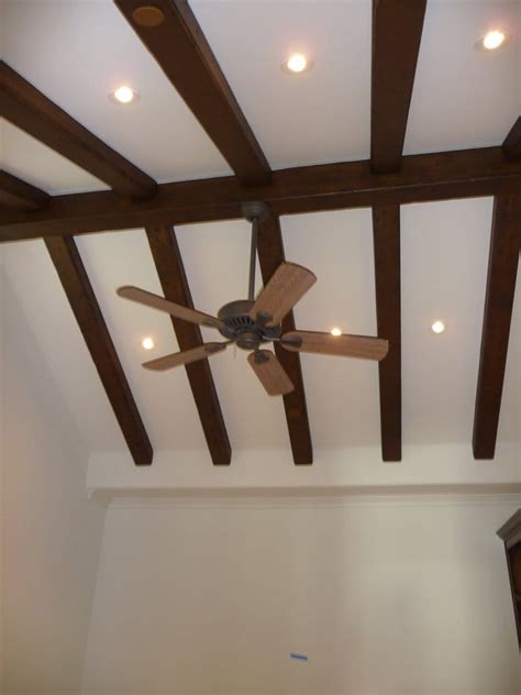 Recessed lighting on vaulted ceilings or sloped ceilings are a refined and classic accent in larger living spaces. vaulted ceiling 45 degree recessed lights and fan | Yelp