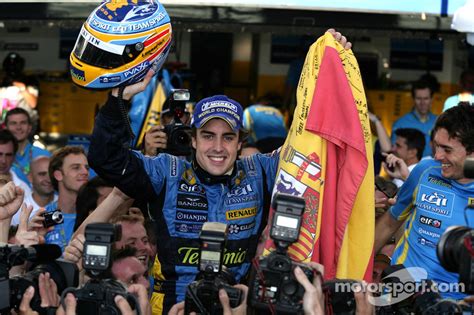 Fernando alonso formula one racing driver. 2006 F1 World Champion Fernando Alonso celebrates with ...