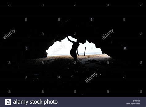 Female Silhouette In Cave Stock Photos And Female Silhouette In Cave