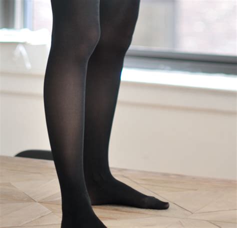 Women`s Legs And Feet In Tights Legs And Feet In Turqouise And Black