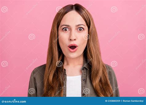 photo of mature woman good mood shock gossip news omg wow reaction isolated over pink color