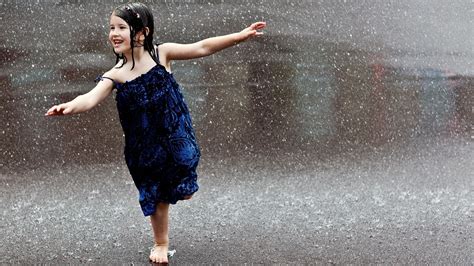 Happy Child Runs In The Rain Wallpapers And Images Wallpapers