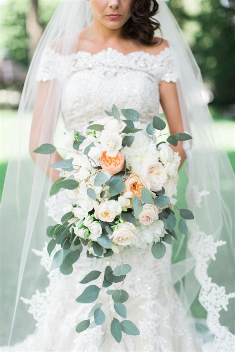 Eucalyptus can be used in practically every element of your wedding, right down to your ceremony program. Romantic Cascading Eucalyptus Bouquet | Eucalyptus bouquet ...